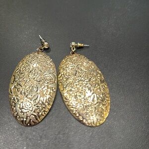 Large gold tone earring with CZ stone